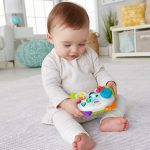 Fisher-Price Pretend Video Game Controller Baby Toy with Music Lights and Learning Songs, Fine Motor Toy - Image 3